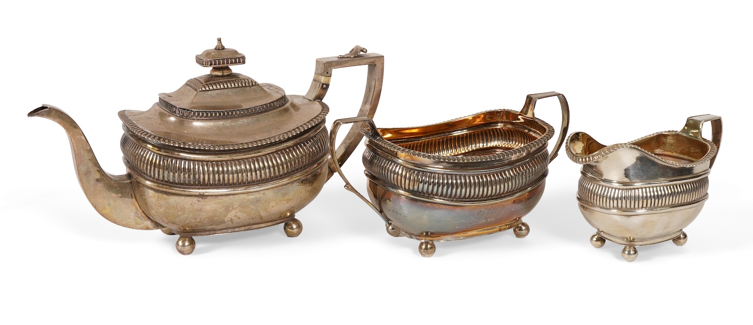 A George III silver three piece tea set, by John Wakefield
